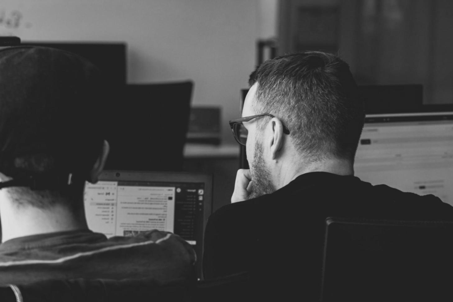 Business professionals reviewing financial documents and reports